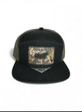 BLACK AND GREEN SNAPBACK WITH CAMO PATCH