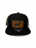 BLACK AND GREEN SNAPBACK WITH BROWN PATCH